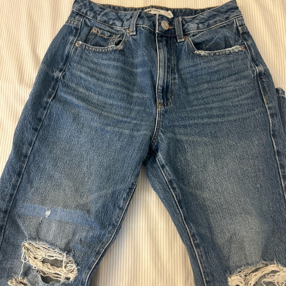 Distressed Blue Denim Jeans